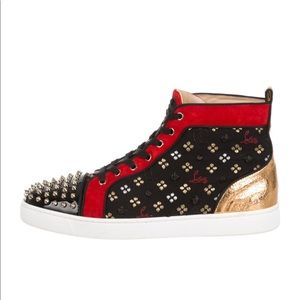 Louboutin spikes and leather sneaker